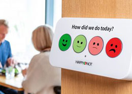 happy-or-not smiley wall provides instant customer feedback